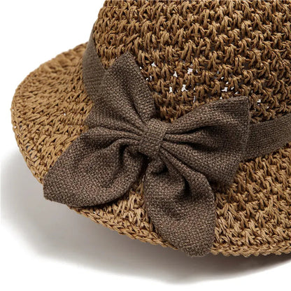 🎀Women's Hand-Knitted Summer Straw Hat, Wide Brim Foldable Beach Hat with Elegant Bow Detail